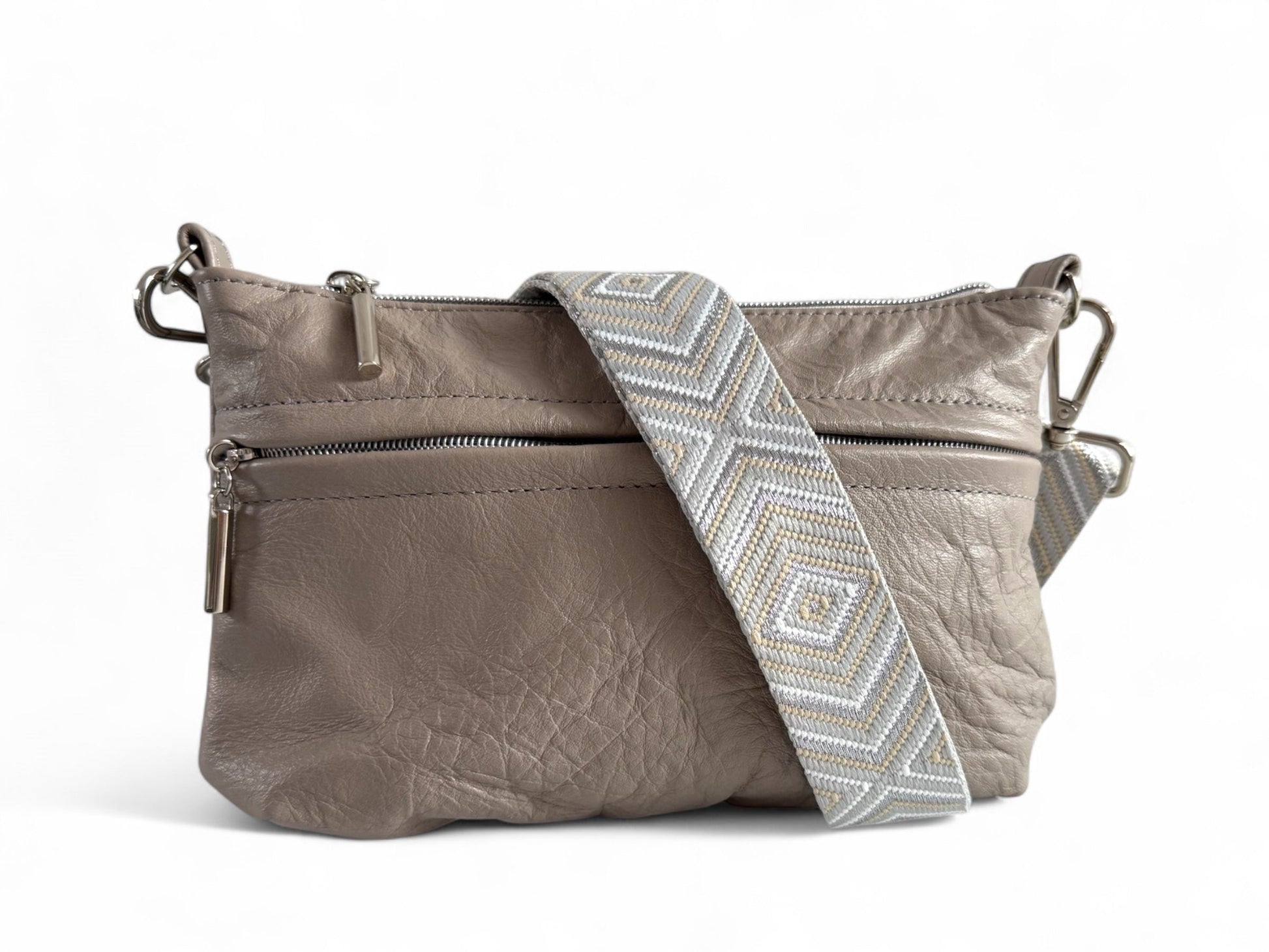 Grey leather crossbody bag with chevron strap, handcrafted in the UK by Lilly & Jude.