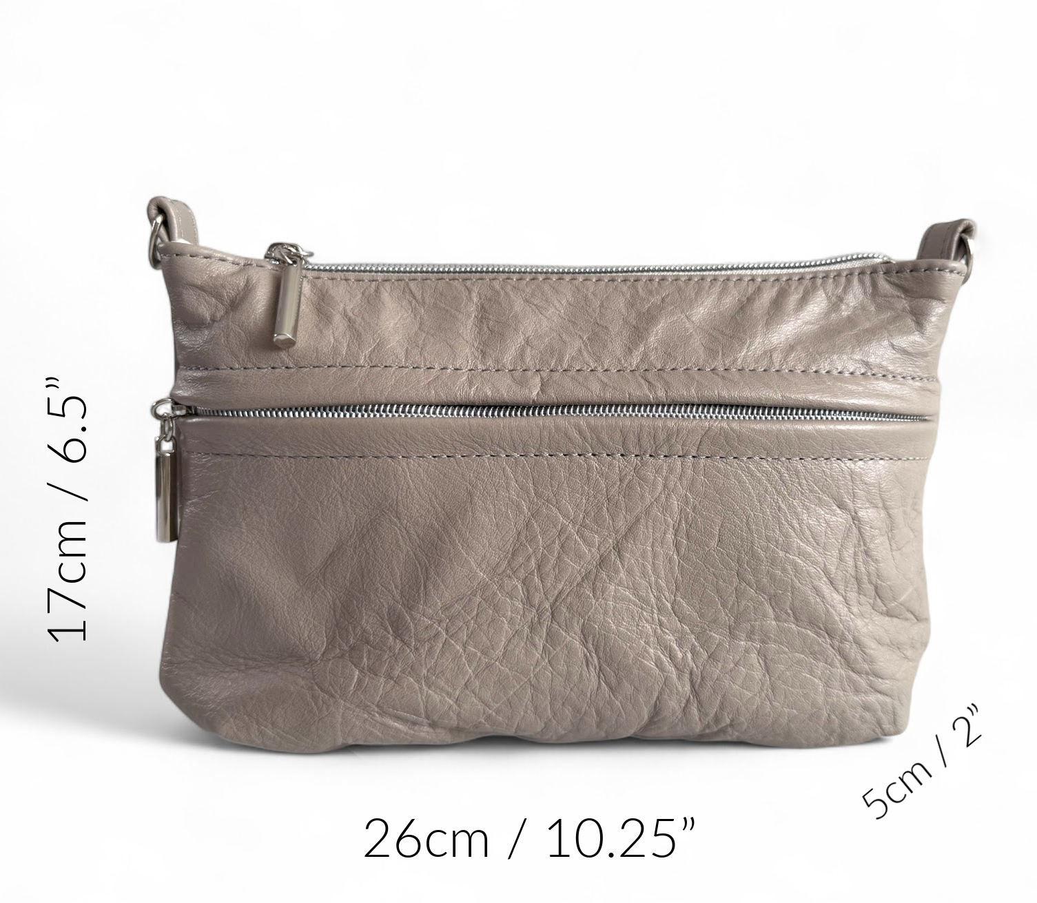 Grey leather crossbody bag with size overlay: 26cm/10.25”, 17cm/6.5”, 5cm/2”, UK made by Lilly & Jude.