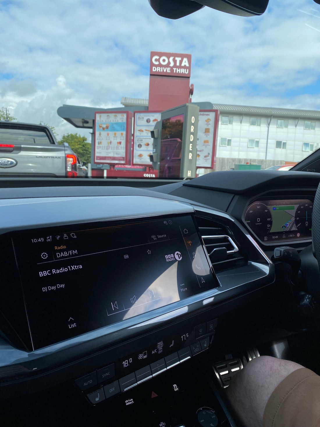 Image of the interior of a car at a Costa Drive-Thru