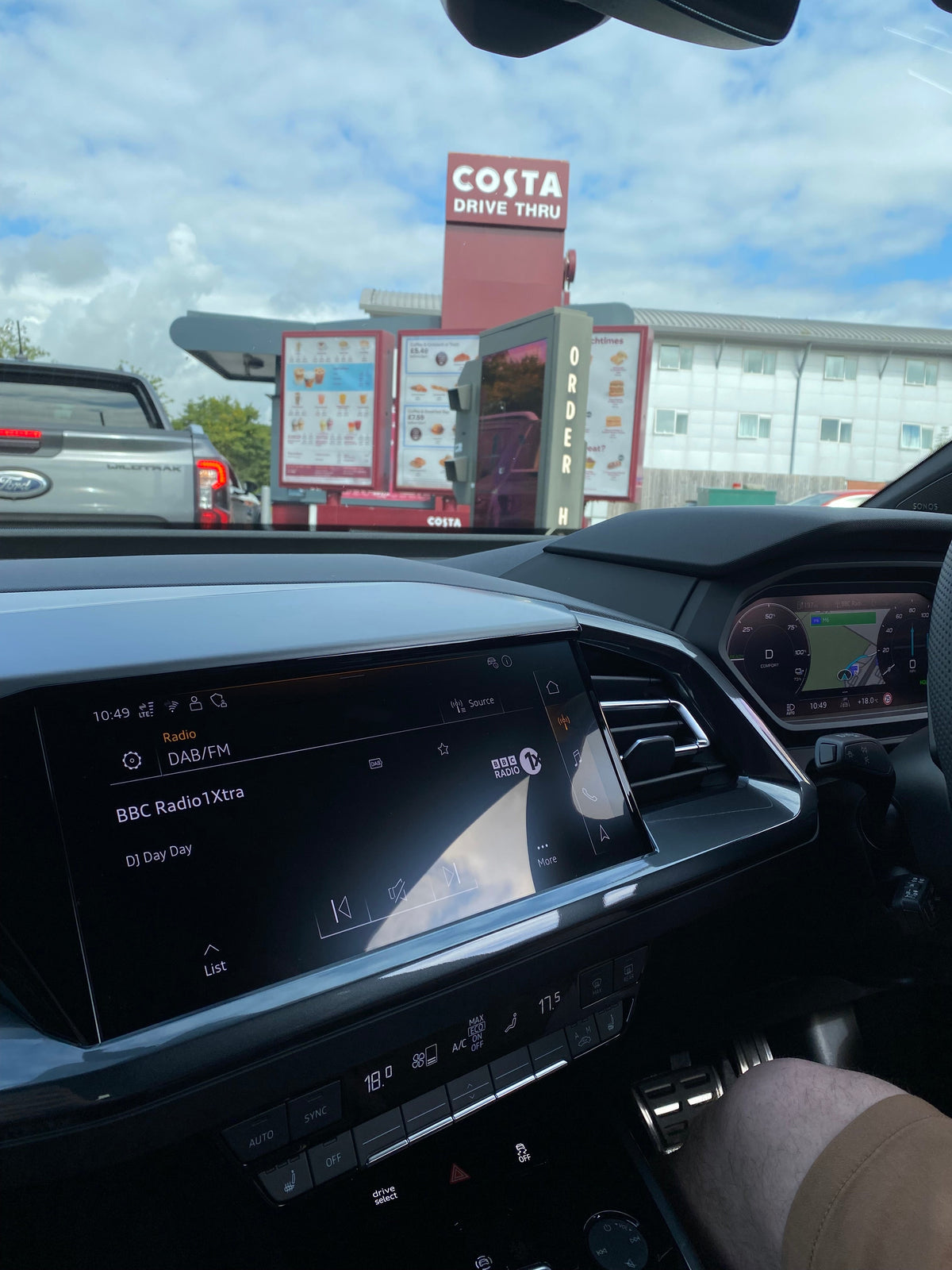 Image of the interior of a car at a Costa Drive-Thru