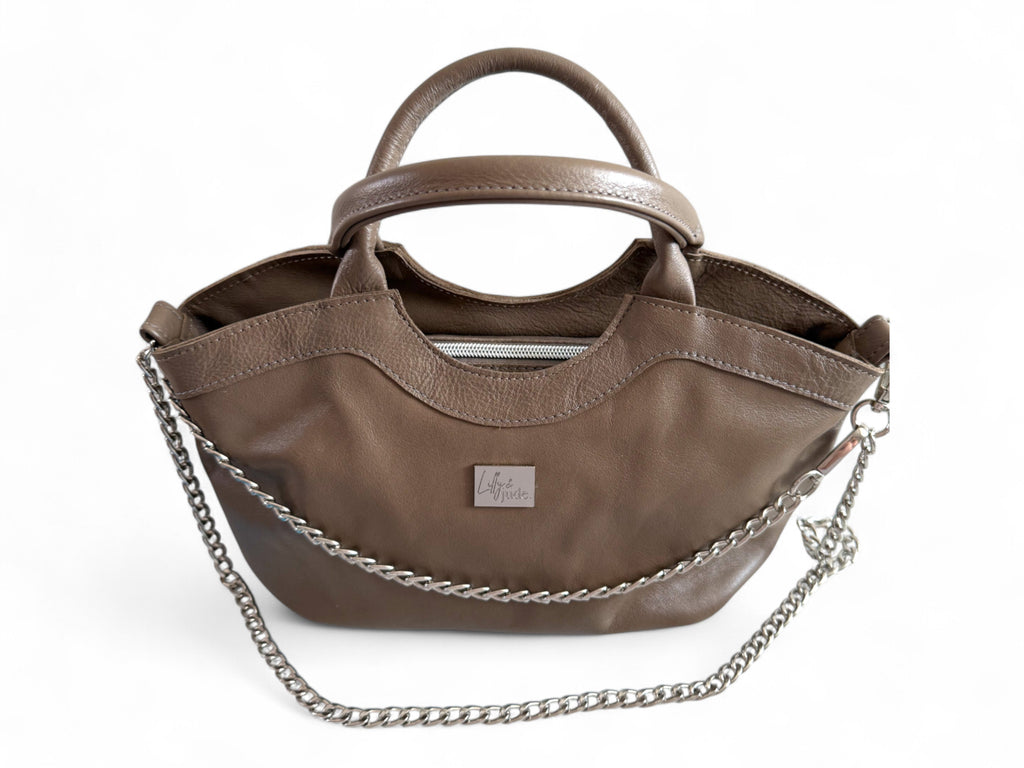 Top view of Flossy handbag showing zipper opening at the top. This slouchy handbag was handmade, using rescued leather  in UK by Lilly & Jude.
