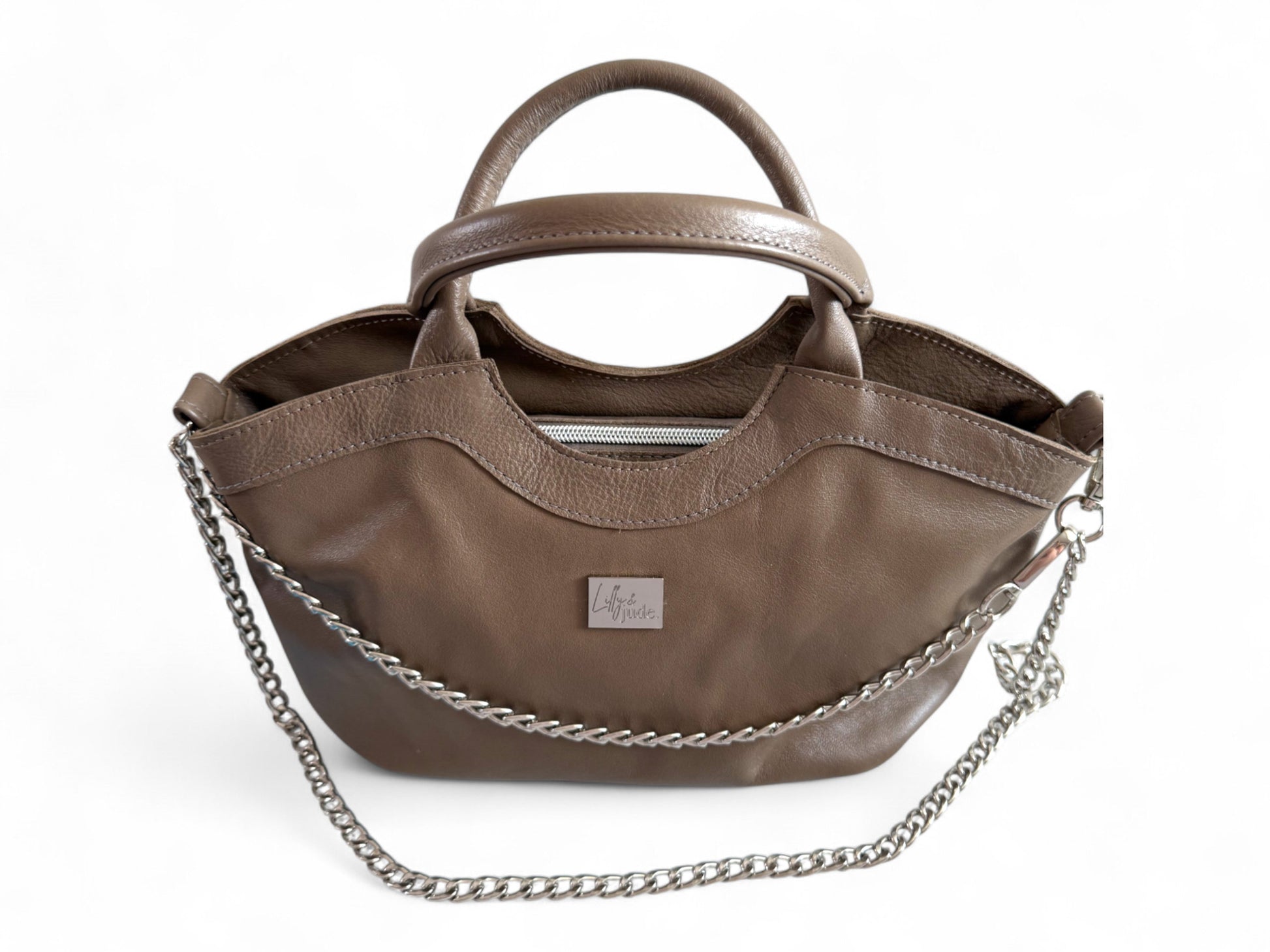 Top view of Flossy handbag showing zipper opening at the top. This slouchy handbag was handmade, using rescued leather  in UK by Lilly & Jude.
