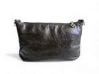 Black leather crossbody bag on a white background