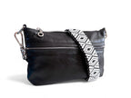 Black leather handbag with a patterned strap on a white background