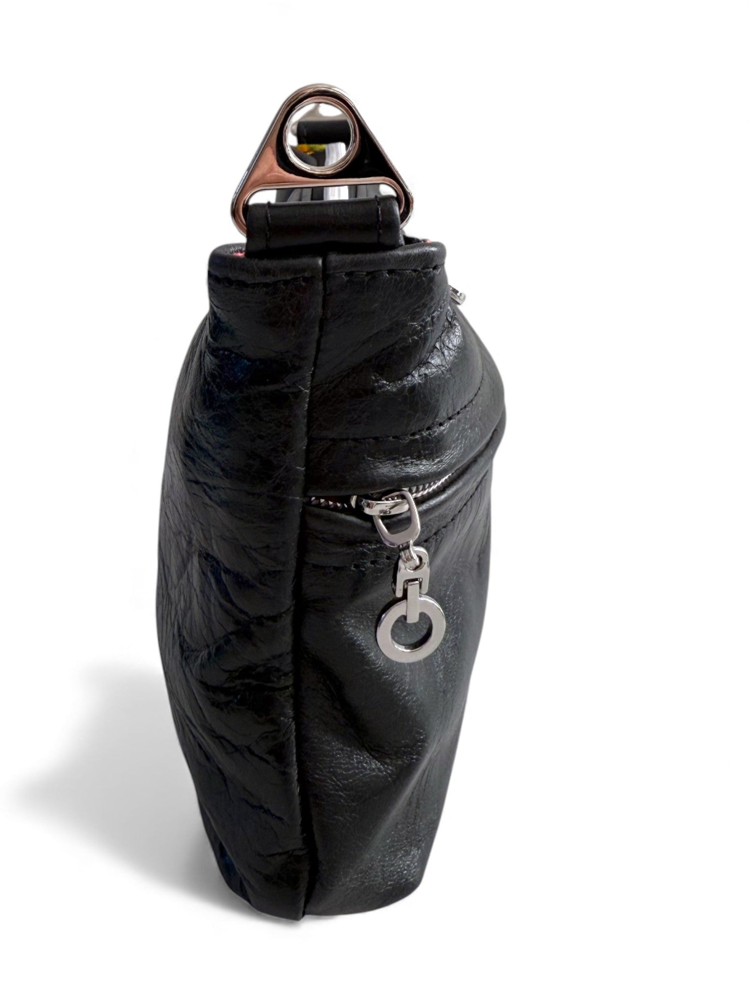 Black leather bag with silver hardware on a white background