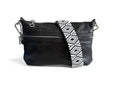Black leather crossbody bag with a white and black patterned strap on a white background