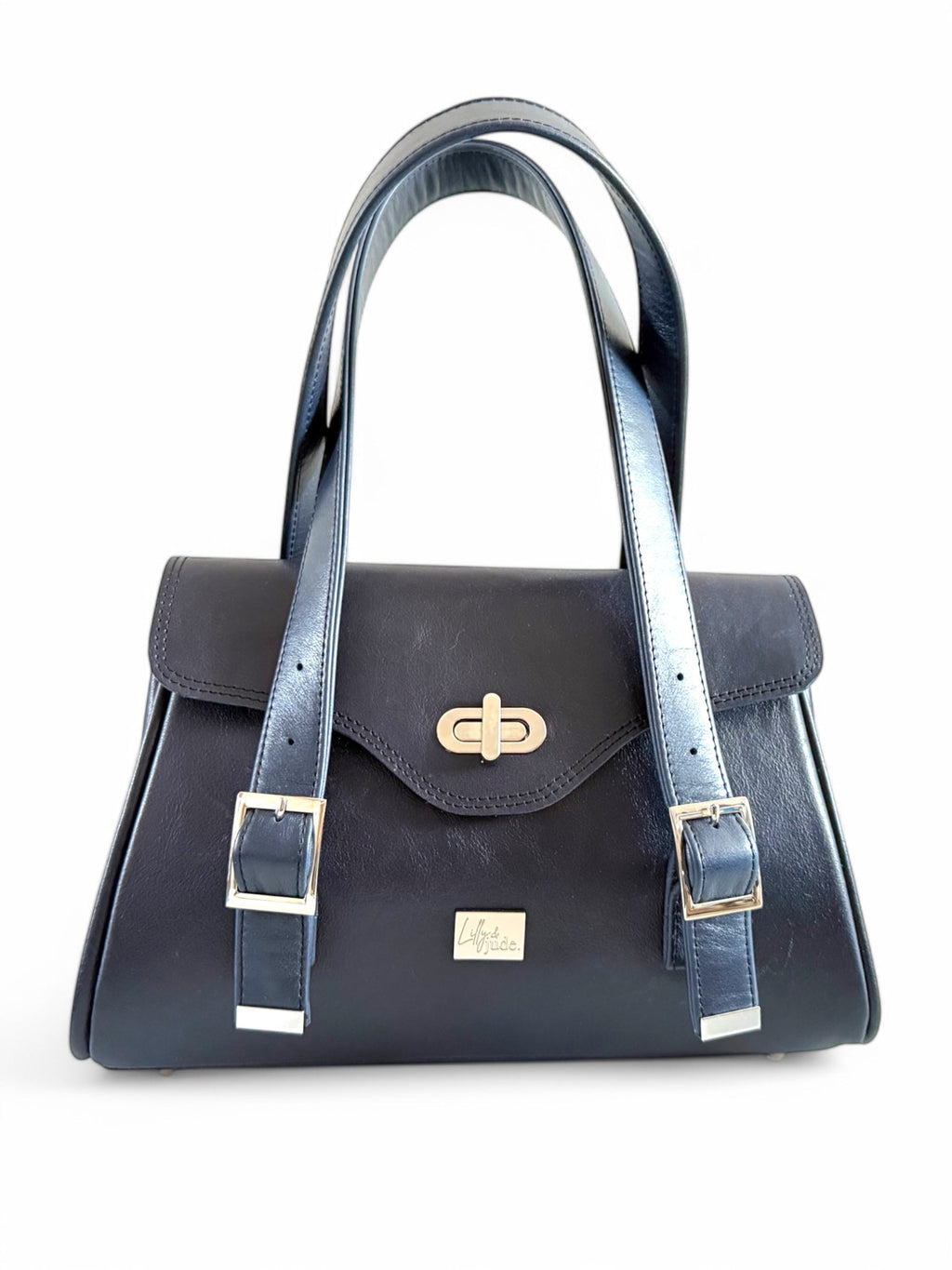 Navy blue handbag with silver clasp on a white background