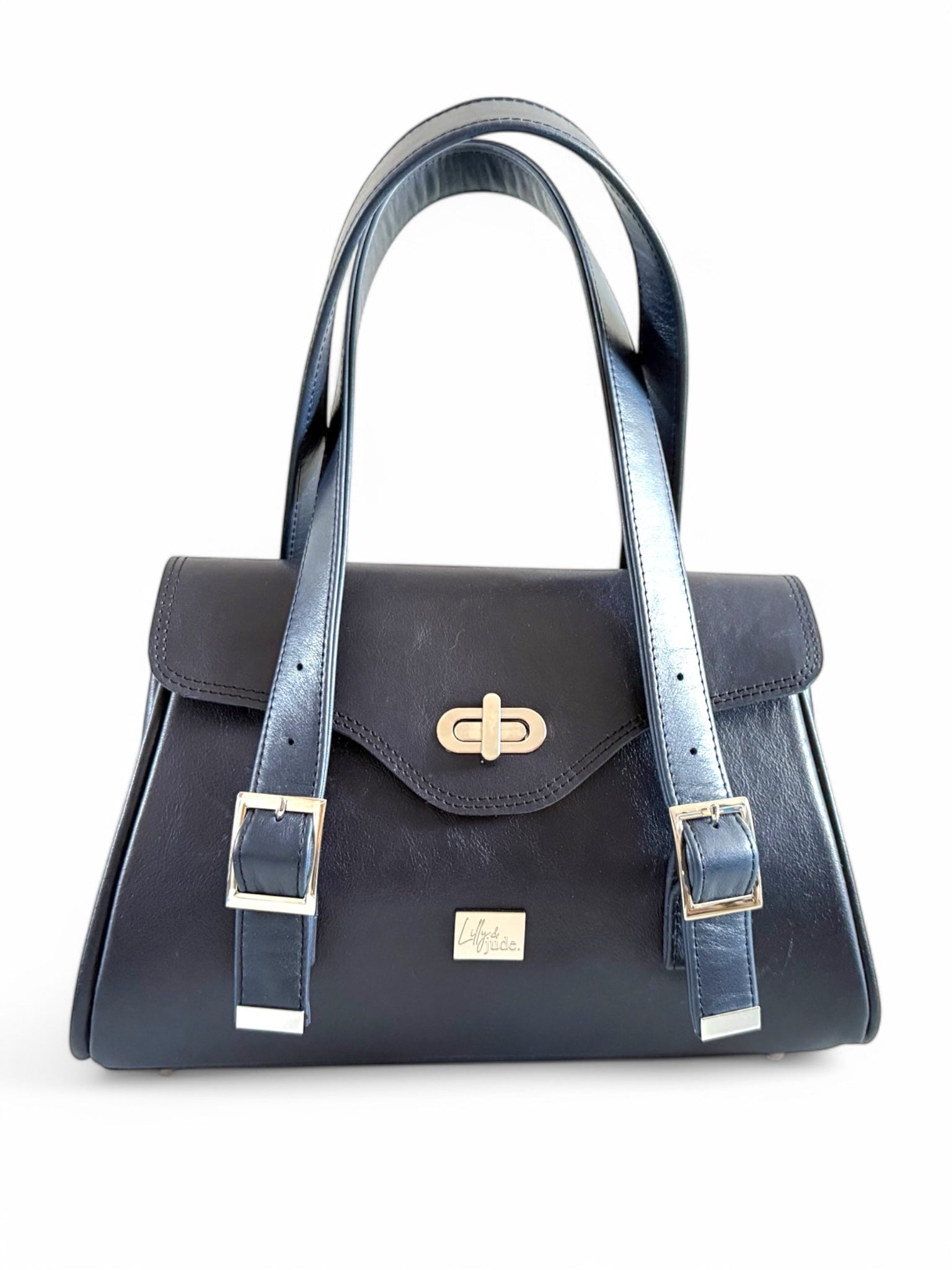 Navy blue handbag with silver clasp on a white background