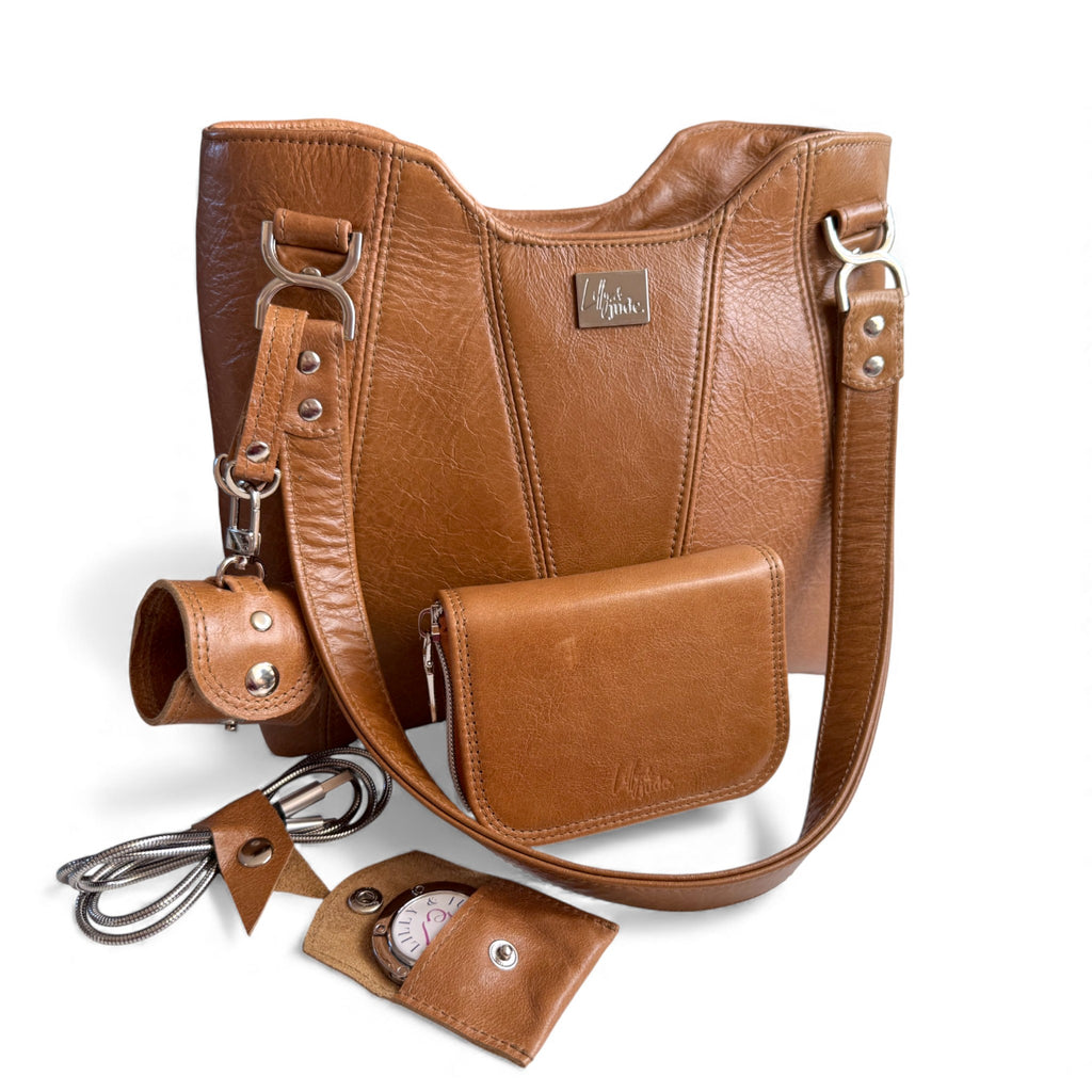 Brown leather handbag with matching wallet / purse, scarf holder, cable keeper and bag hook in a matching pouch, on a white background