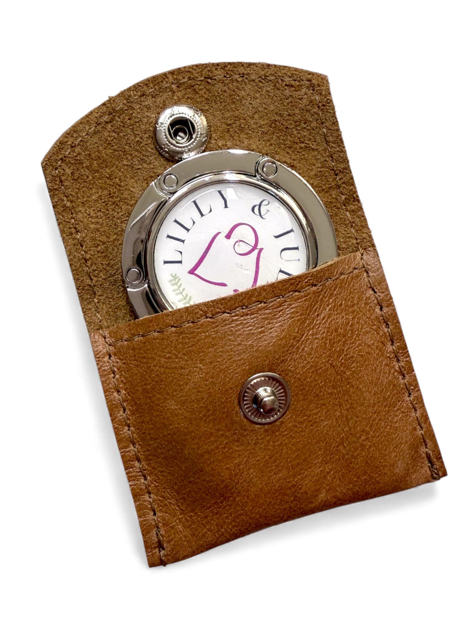 Lilly & Jude logo'd bag hook in a handcrafted leather case, to match the tan leather Alaula Handbag 