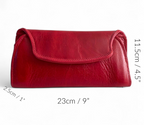 Red leather clutch purse with measurements displayed on a white background