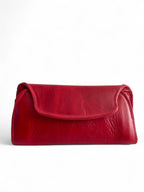 Red leather clutch style  handbag on a white background