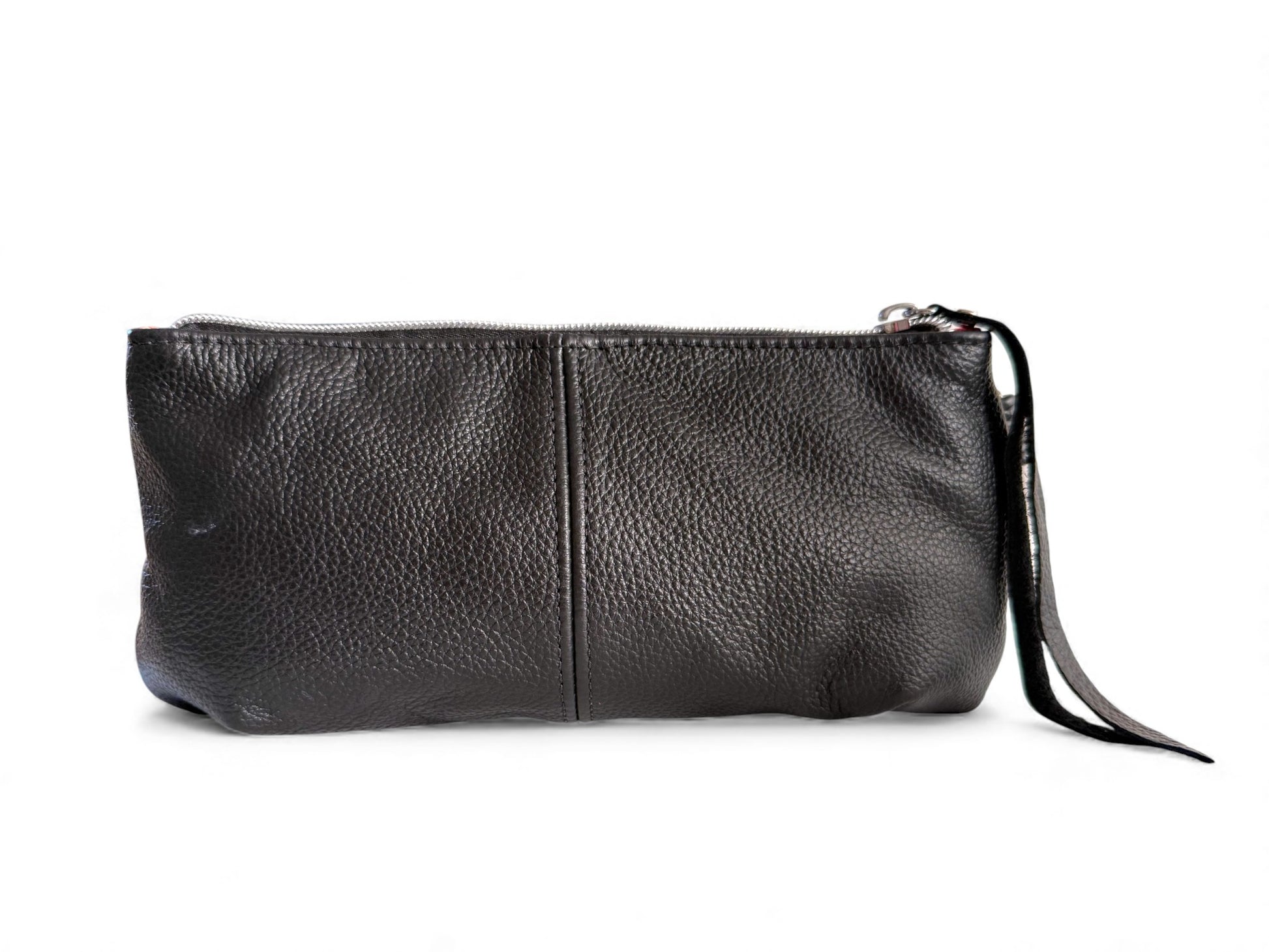 Rear view of the Ella, Black leather clutch bag with a strap on a white background