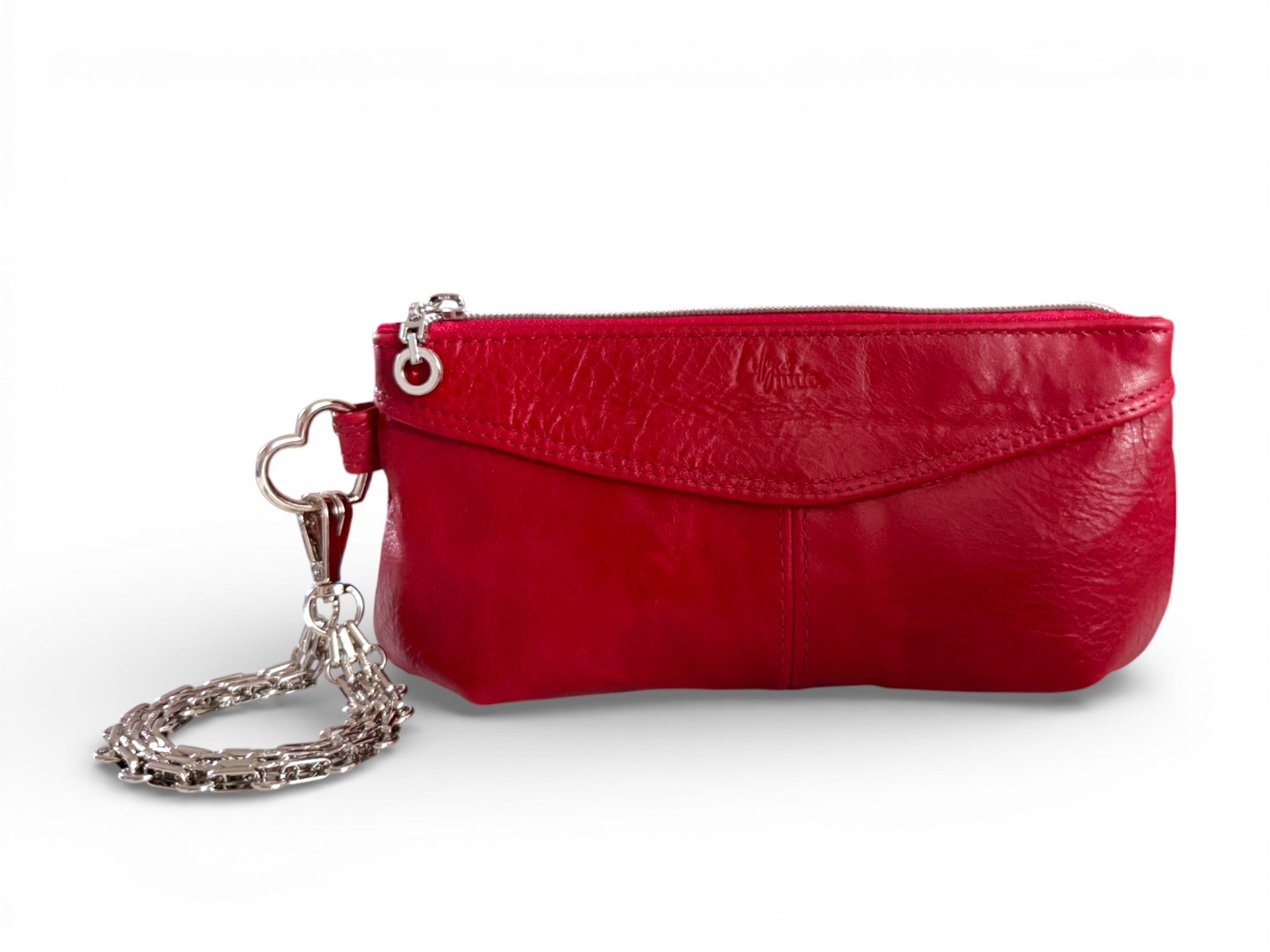 Red leather clutch with a heart shaped connector and silver chain strap on a white background