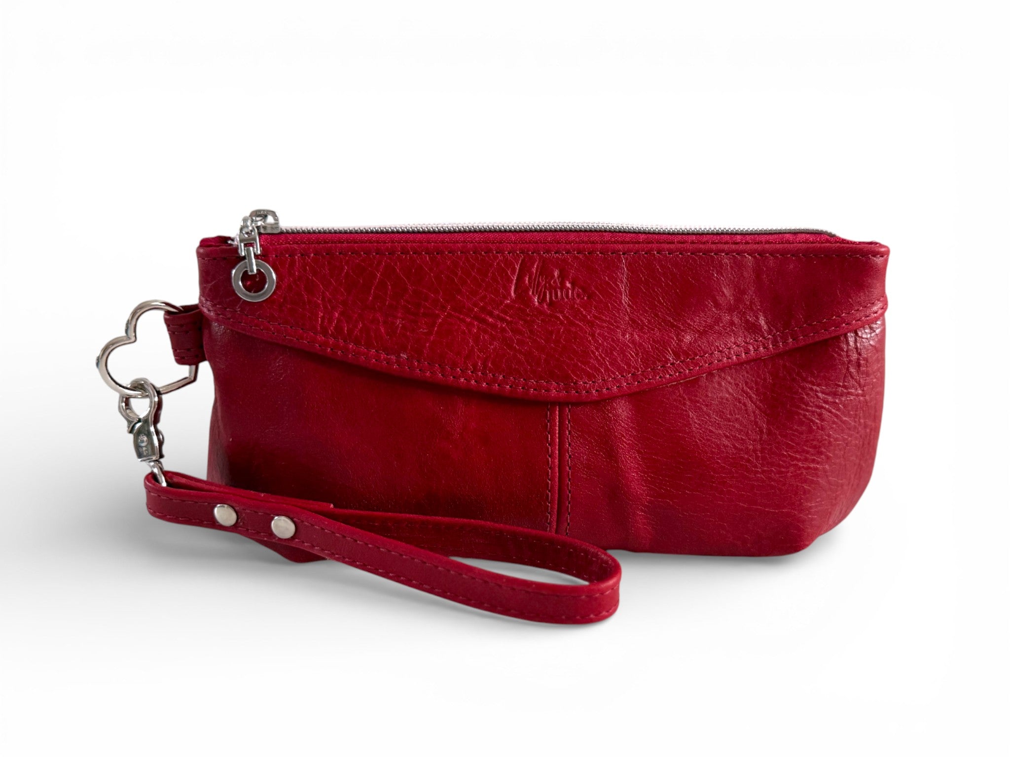 Red leather clutch with wrist strap on a white background