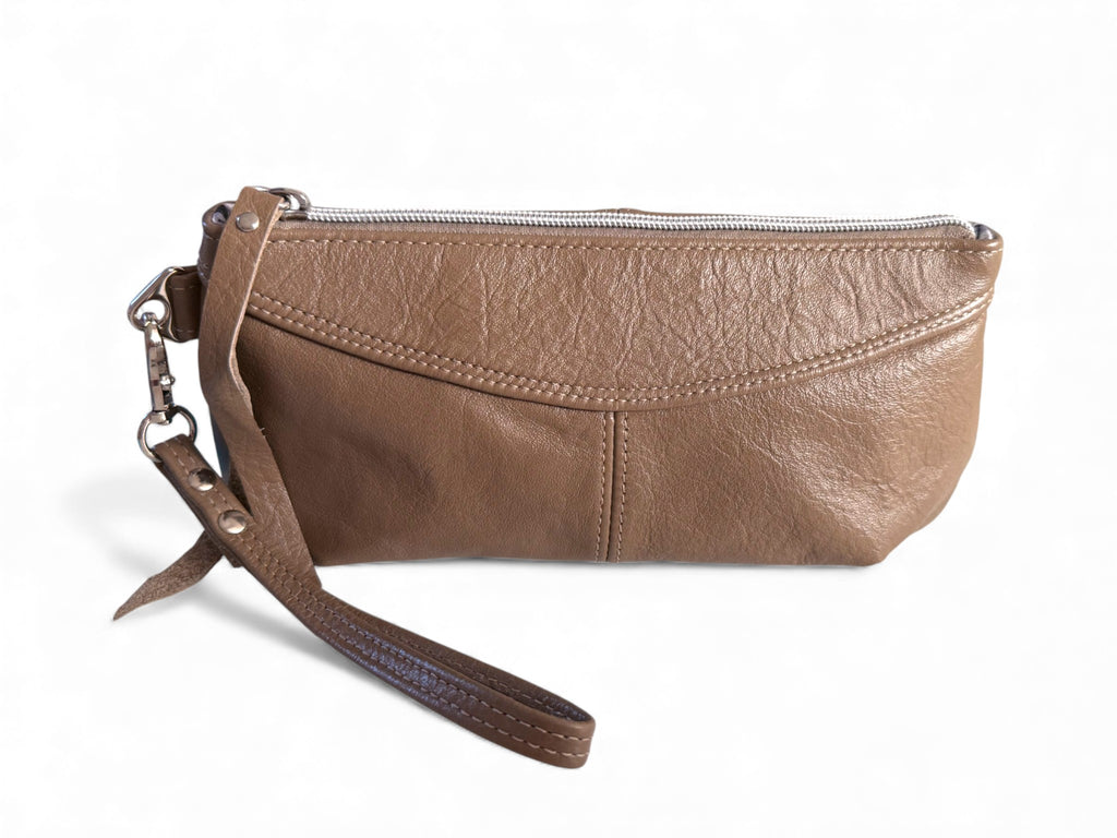 Taupe brown grey leather clutch bag with wrist strap on a white background