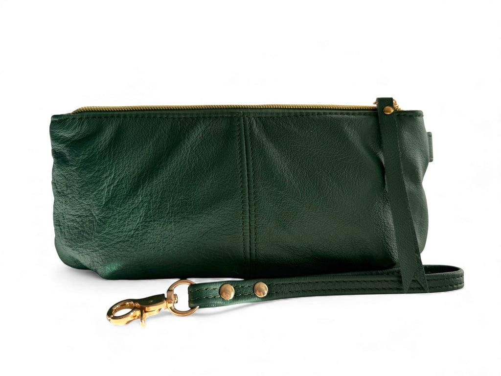 View of the back of the Ella, a Green leather clutch bag with a strap on a white background