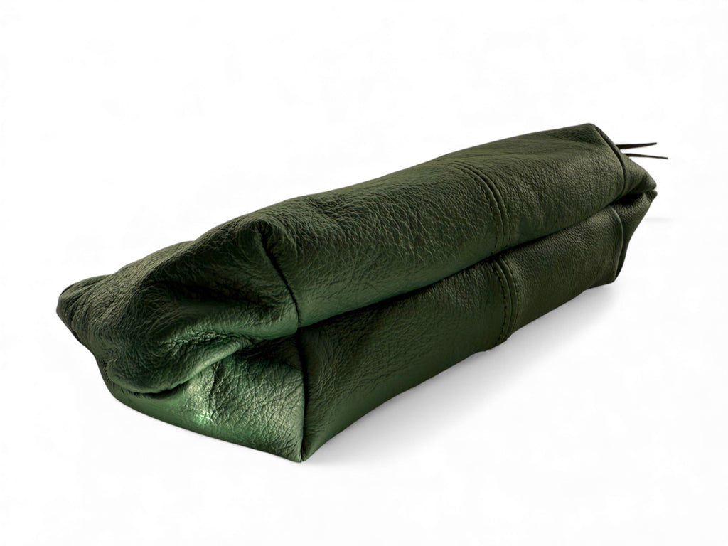View of the bottom the Ella wristlet clutch bag. Made from green rescued leather, exclusive to Lilly & Jude