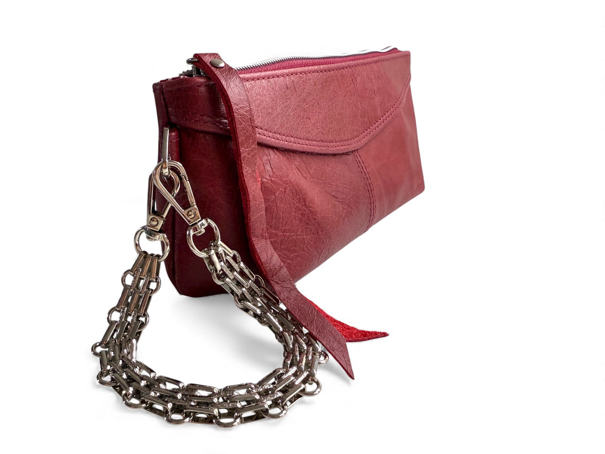 Red leather Ella bag with a chain style wrist strap (an optional extra) on a white background