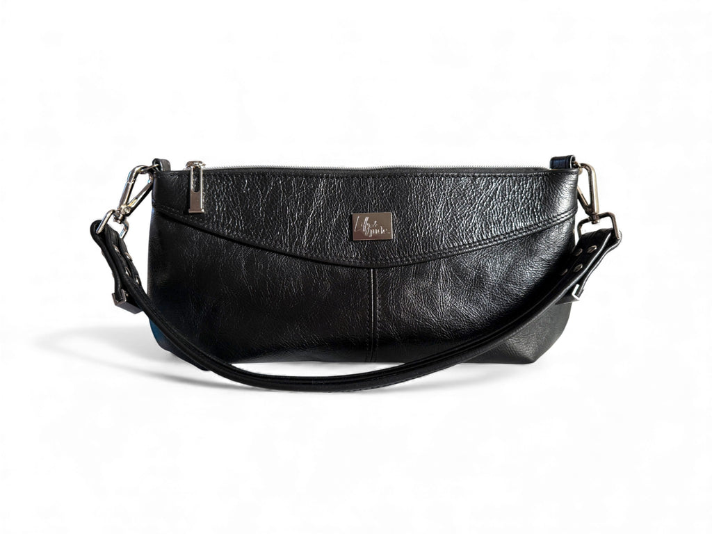 Black leather baguette style handbag with a visible Lilly&Jude  brand logo on a white background