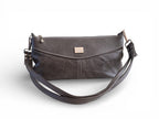 Dark grey leather handbag with a double strap on a white background