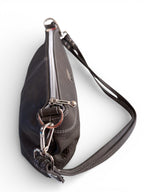 Top view of a charcoal grey leather handbag with silver zippers on a white background