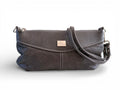 Gray leather handbag with a visible brand label on a white background