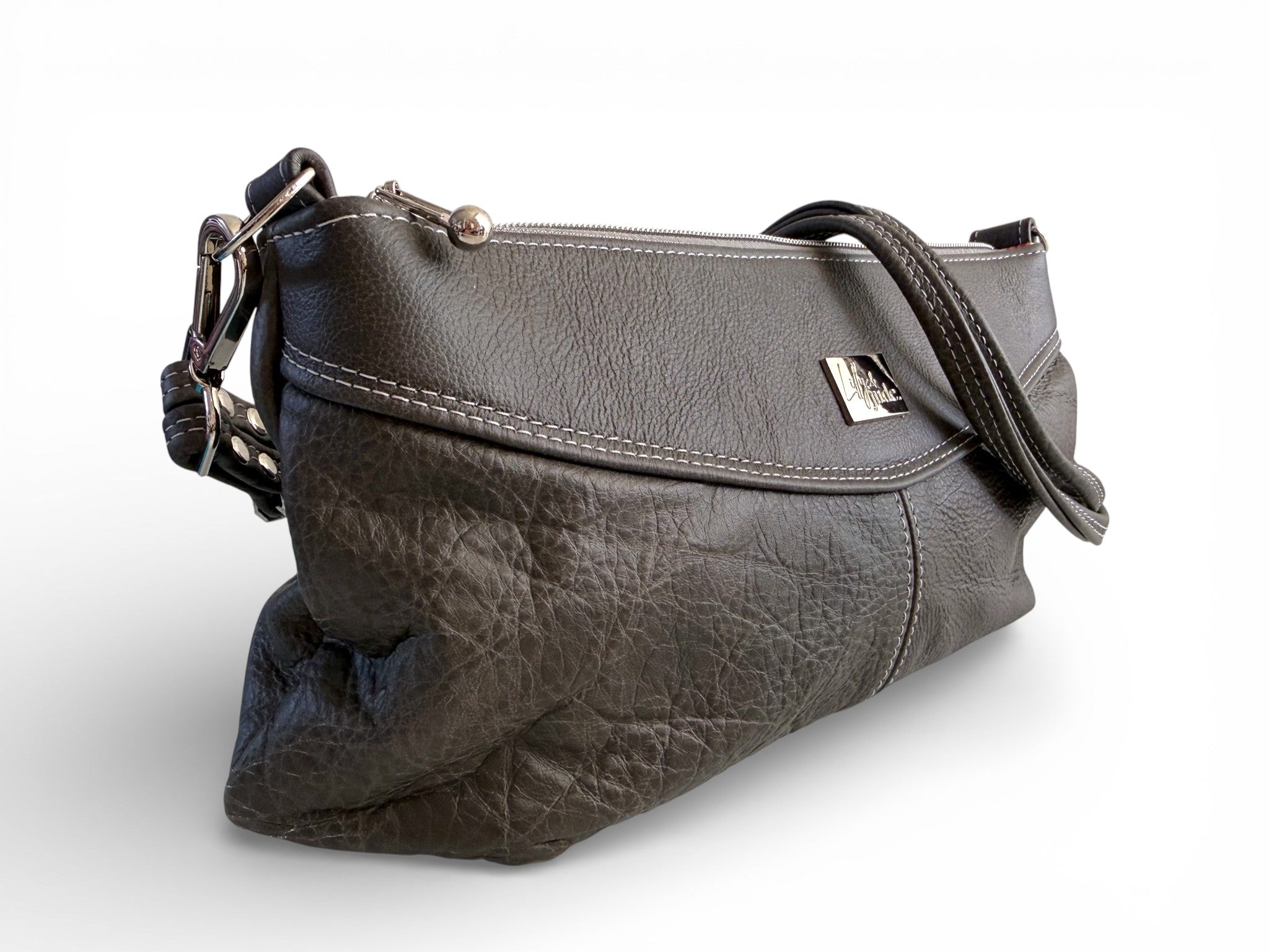 Gray leather handbag with a strap and silver hardware on a white background