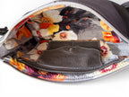 Floral-patterned bag interior with a leather integrated purse