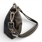 Side view of a dark grey leather handbag with metal hardware on a white background
