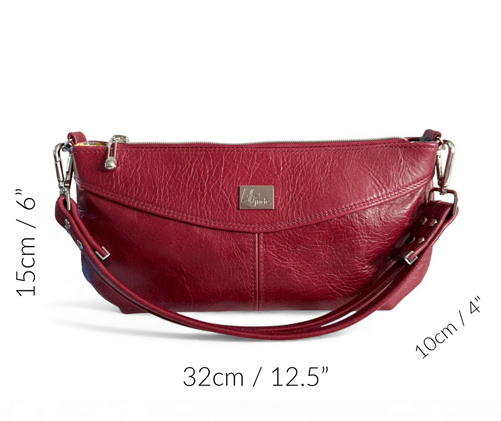 Red Elland handbag with measurements on a white background