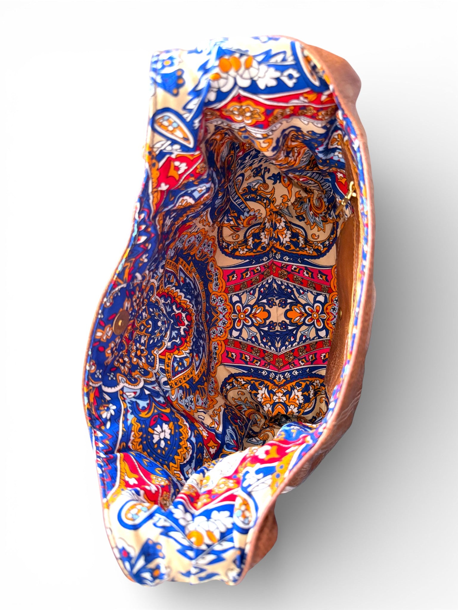 Birds Eye view of the open Estrella bag, showing the colourful, paisley style patterned fabric of the interior (and, frankly, the bloody awesome pattern matching on the inside seem - Oof! Beautiful!)