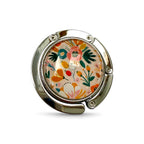 Floral-patterned handbag hook on a white background