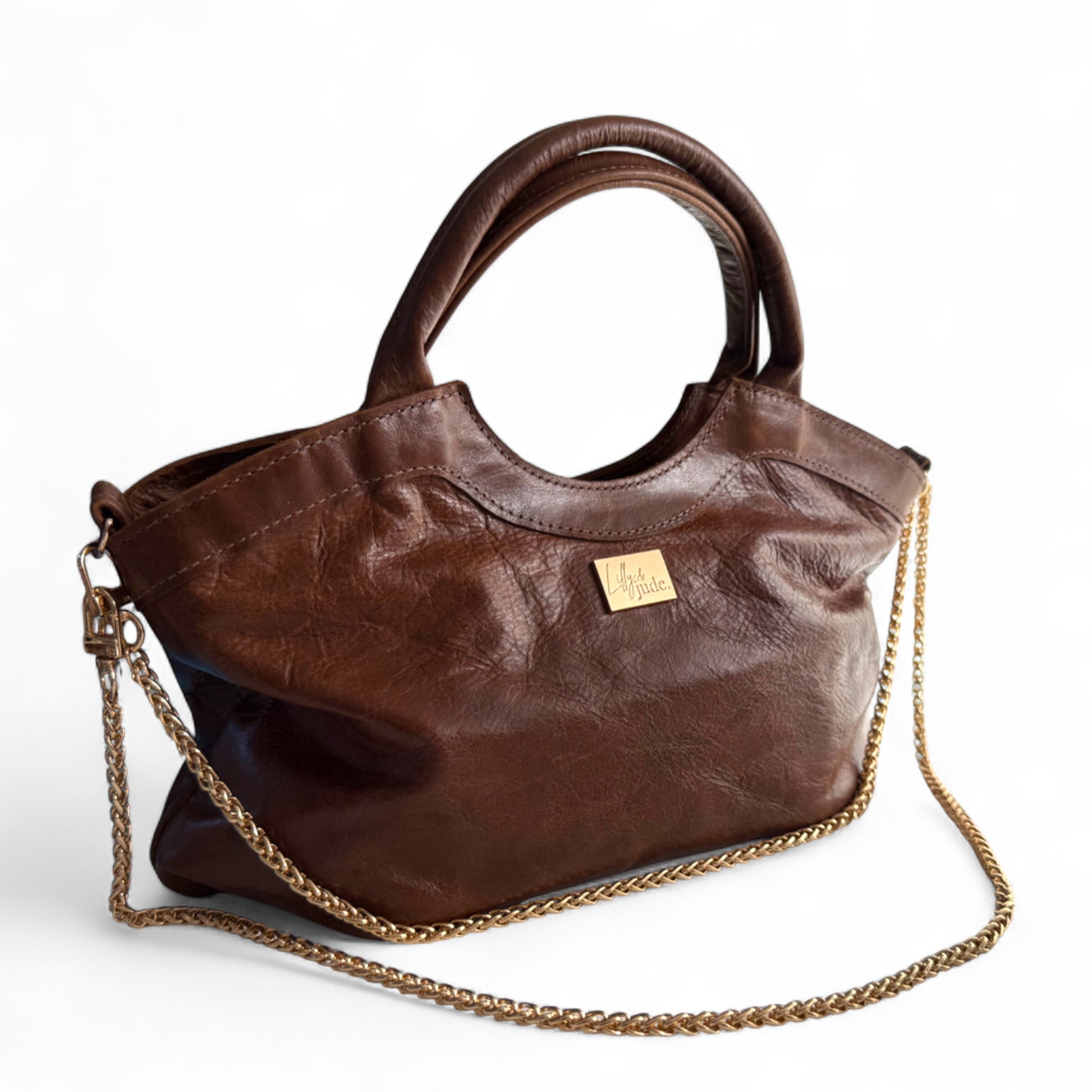 Chocolate Brown leather Flossy handbag with a gold chain on a white background Handcrafted in Shropshire by Lilly & Jude