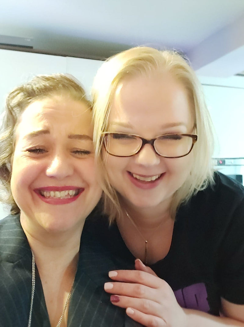 Two women posing for a selfie 