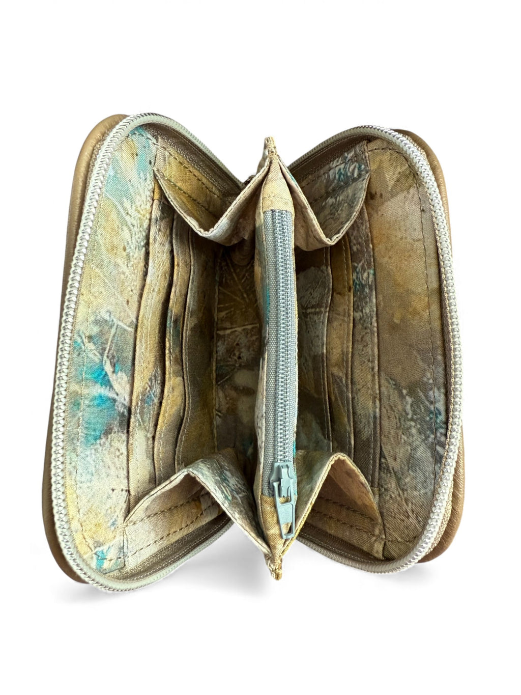 Open wallet with patterned lining on a white background