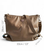 Taupe brown leather handbag with measurements displayed.