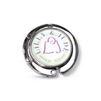 Handbag hanger with 'Lilly & Jude' branding on a white background