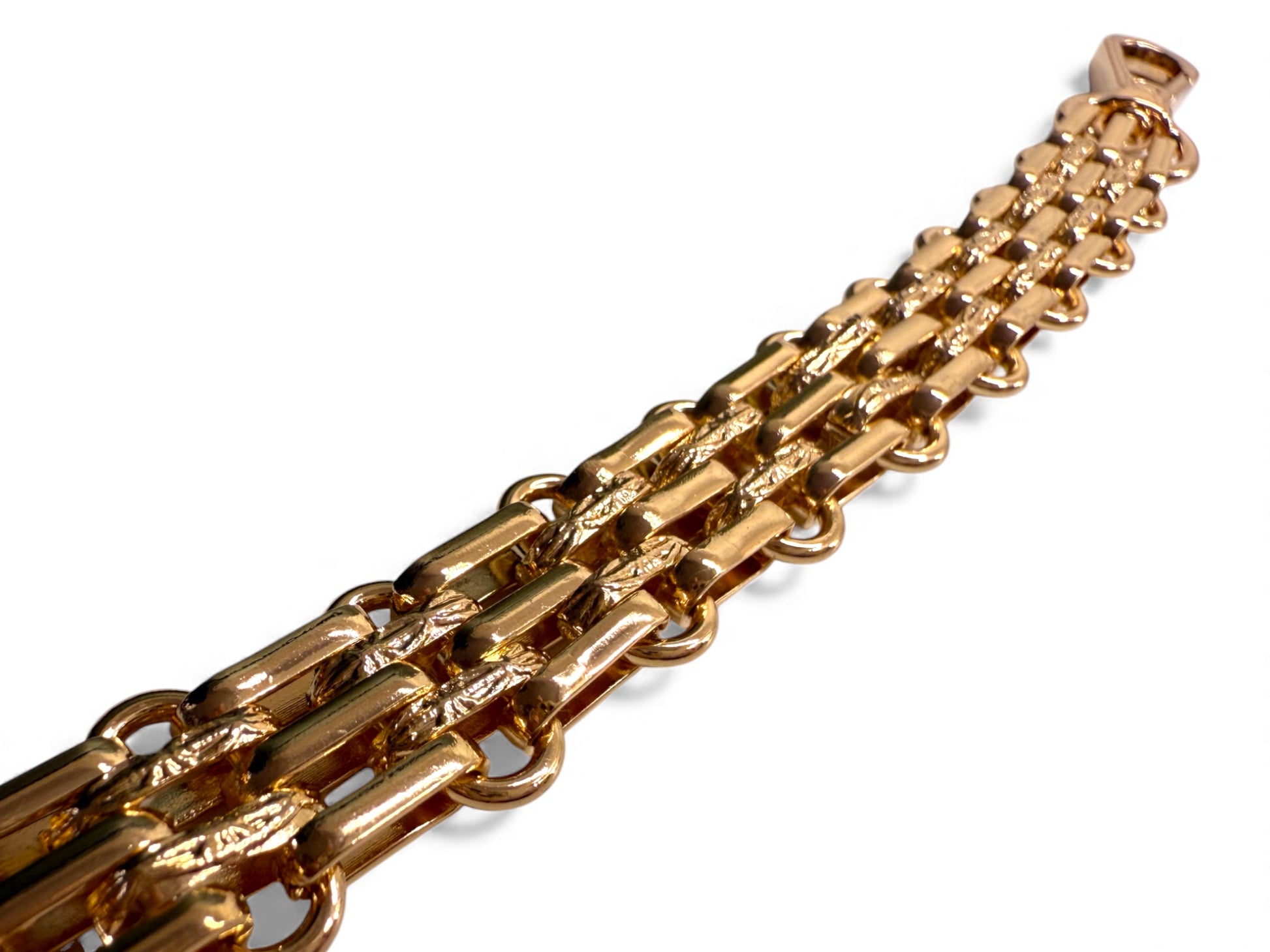 Gold chain bracelet bag strap on a white background