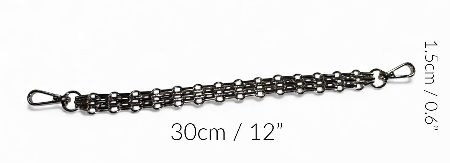 Silver chain wrist strap with measurement details on a white background