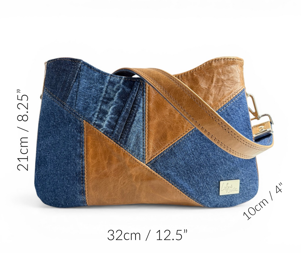Patchwork handbag with denim and brown leather sections, showing measurements on a white background.