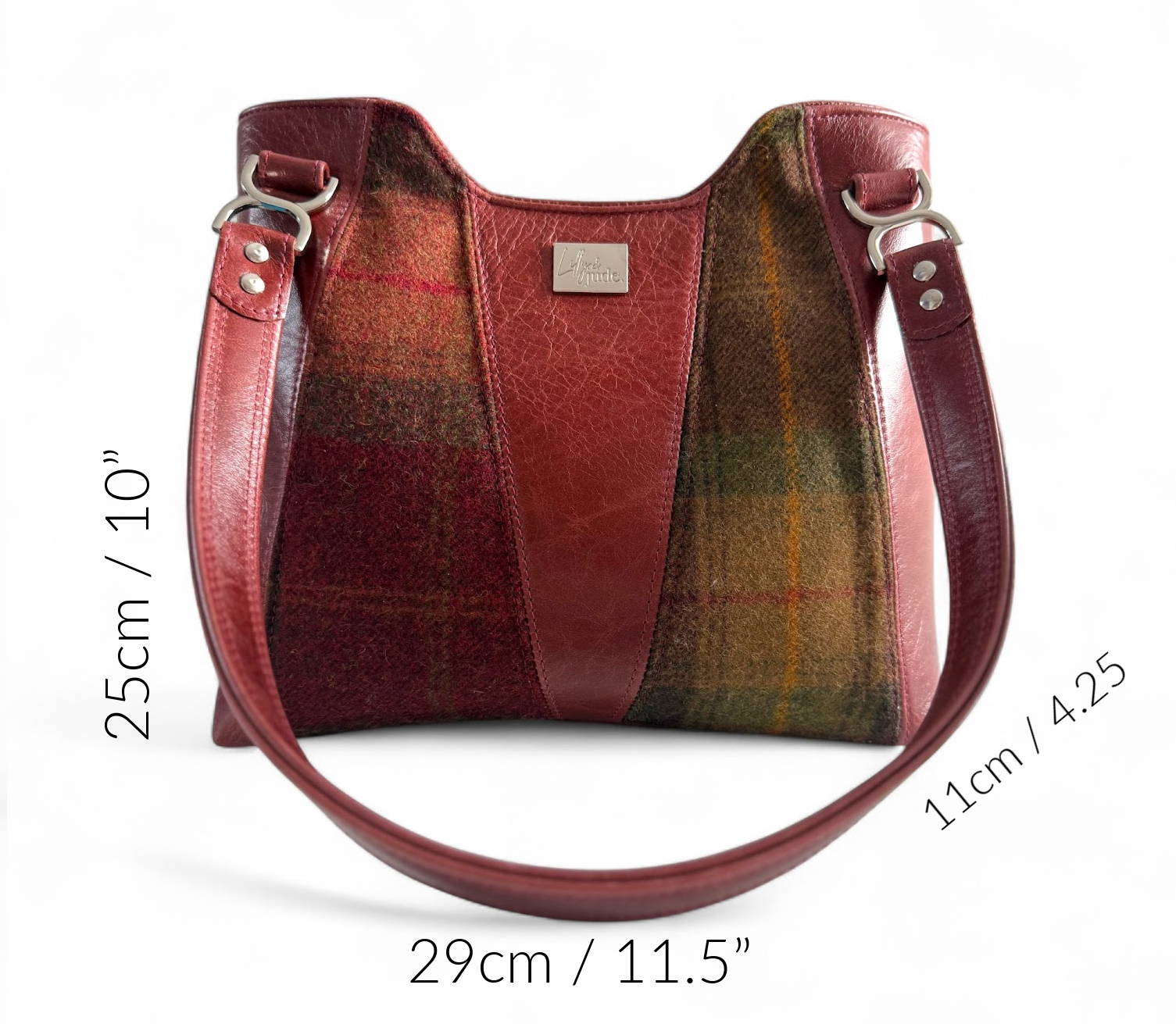 Alaula handbag with measurements noted as an overlay: Width = 29cm/11.5”. Height = 25cm/10”. Depth= 11cm/4.25” 
