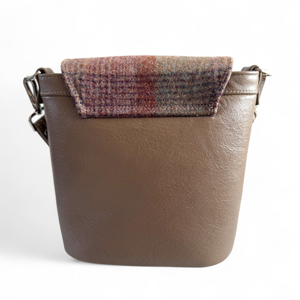 Rear view of Belle bucket bag, showing tweed detail and back structure, against a white background
