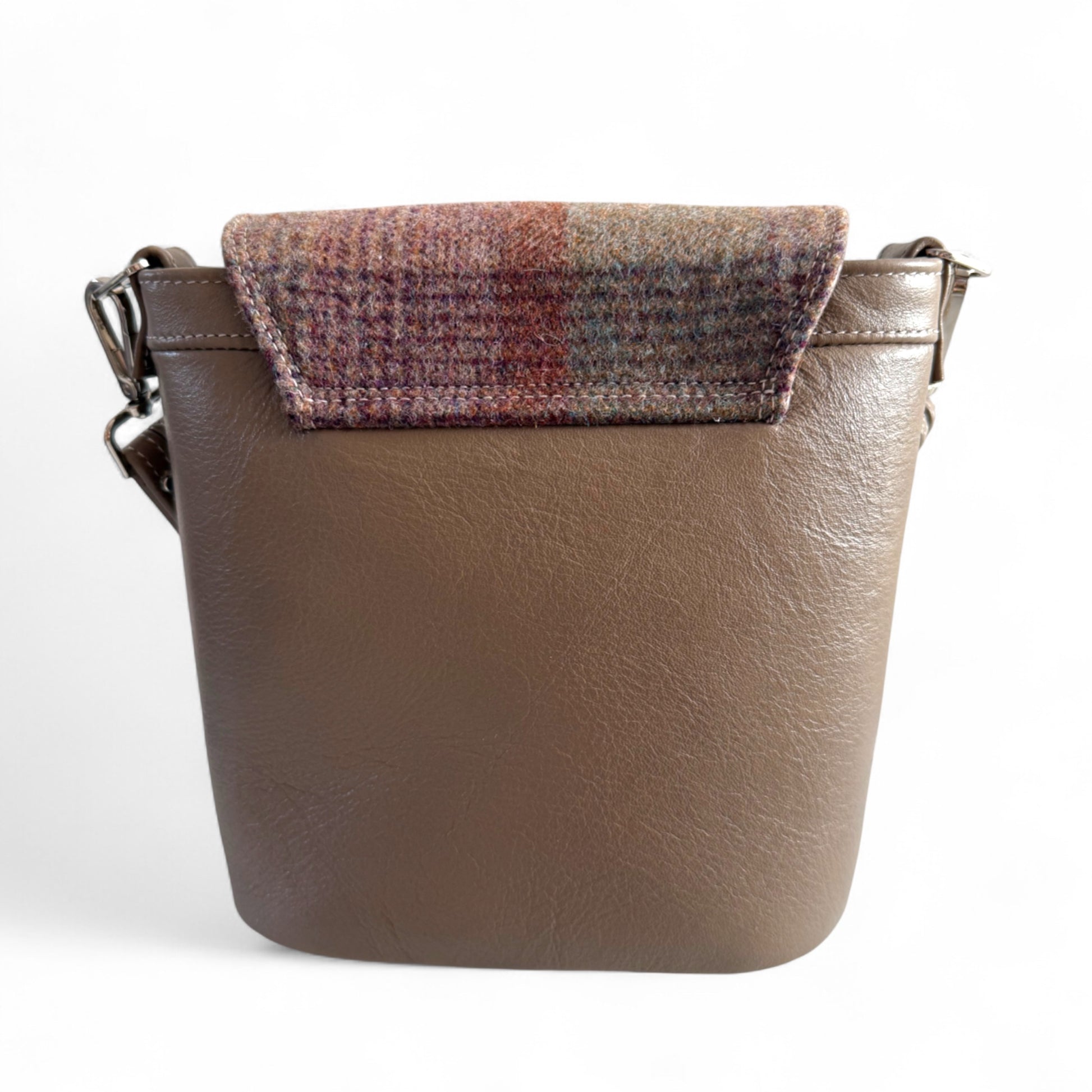 Rear view of Belle bucket bag, showing tweed detail and back structure, against a white background
