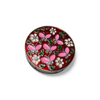 Round decorative bag hook with floral and butterfly design on a red background
