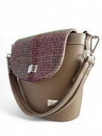 Taupe leather bucket handbag with tartan woollen tweed panels, handmade by Lilly & Jude in the UK.

