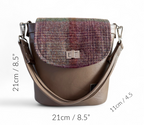 Belle handbag with overlay to indicate the measurements of the bag: Width =  21cm/8.5”. Height = 21cm/8.5”. Depth = 11cm/4.5” 
