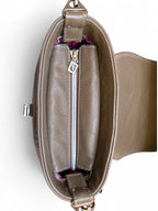 Top view with flap open showing the silver zipper opening of the hand crafted Belle handbag.
