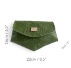 Green leather crossbody bag with dimensions marked on a white background