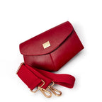 Red leather handbag with matching strap and gold clasp on a white background